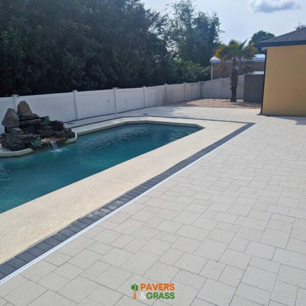 Removal and installation of new pavers in the pool area