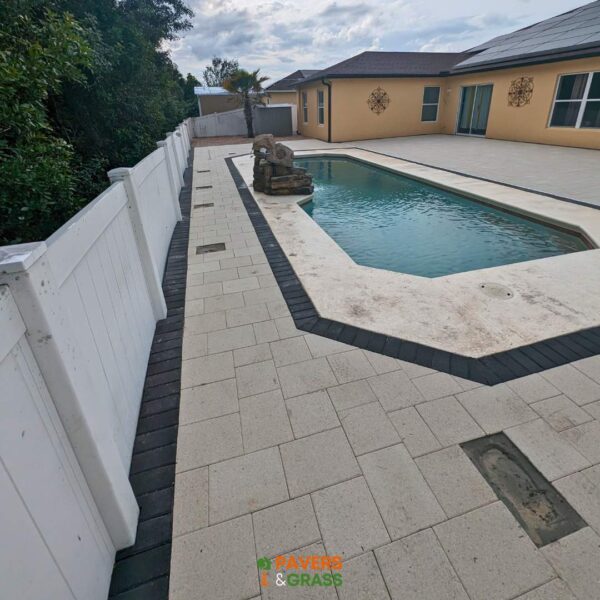 Removal and installation of new pavers in the pool area