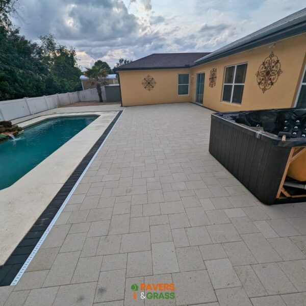 Removal and installation of new pavers in the pool area