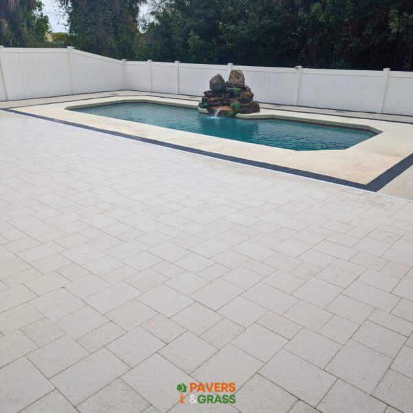 Removal and installation of new pavers in the pool area