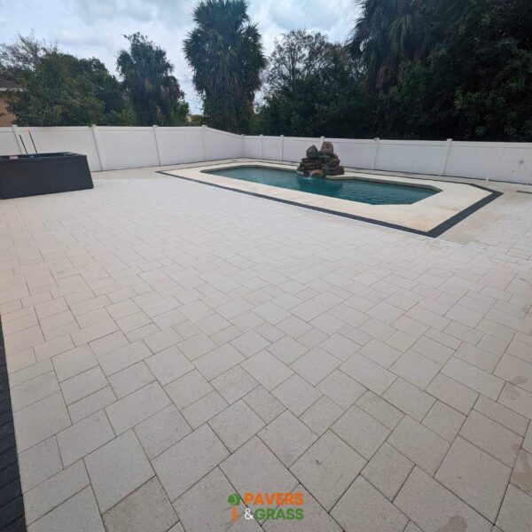 Removal and installation of new pavers in the pool area