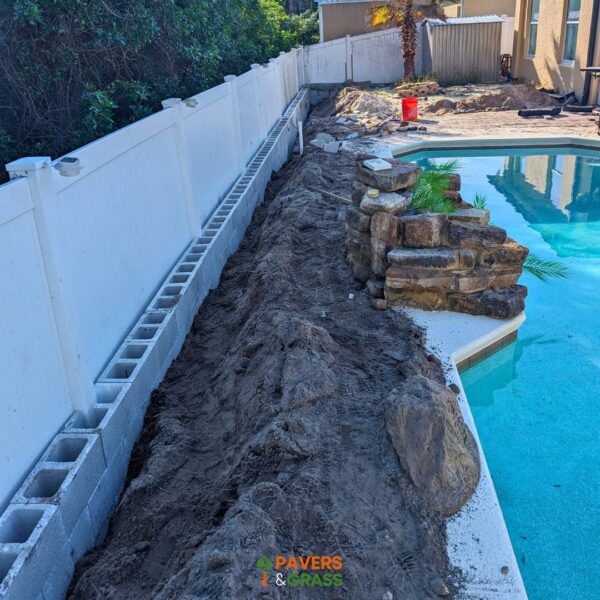 Removal and installation of new pavers in the pool area