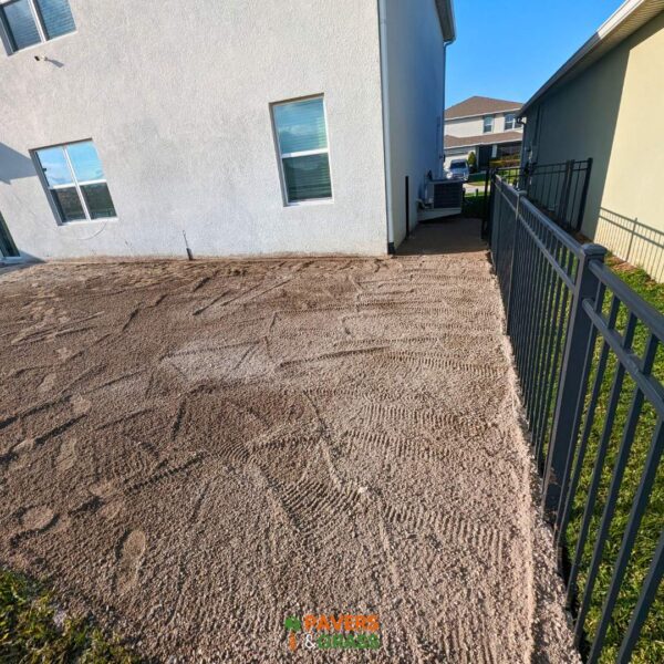 Backyard and sidewalks with white charcoal pavers