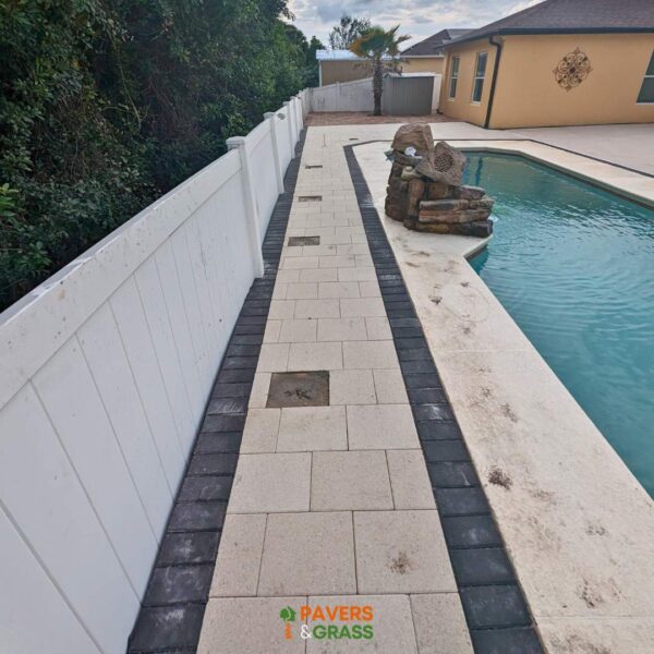 Removal and installation of new pavers in the pool area